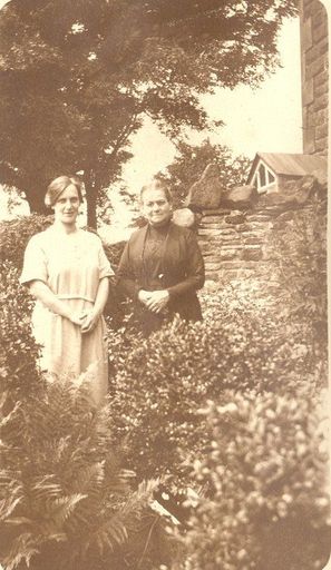 2 women in a garden