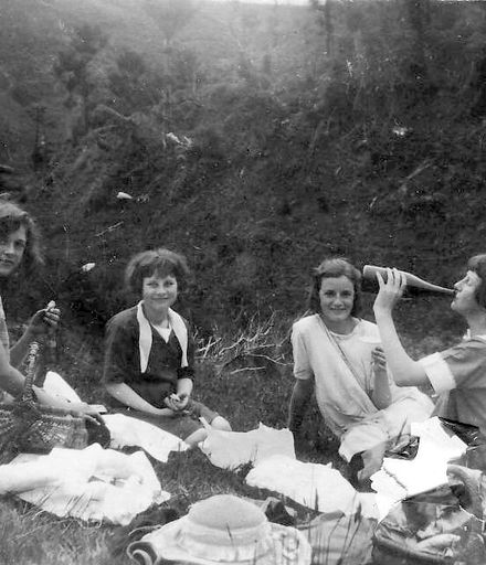 Four young women having picnic on Heights Road, early 1930's