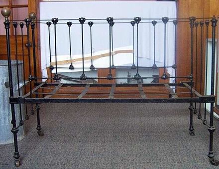 Black iron cot