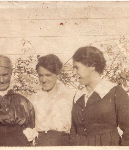Three Dunckley women in garden, c.1920