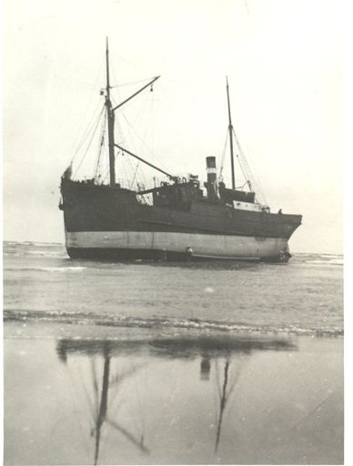 Unidentified Ship Aground on Beach