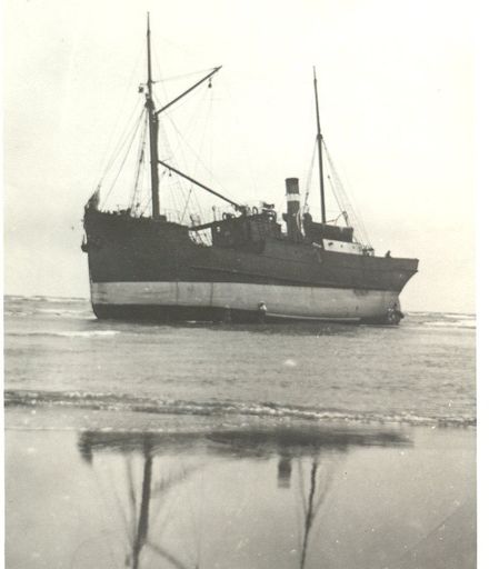 Unidentified Ship Aground on Beach