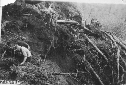 Eight men surveying damage to road & recovering electric cable ?, Mangahao, 1936 - Resource cover image