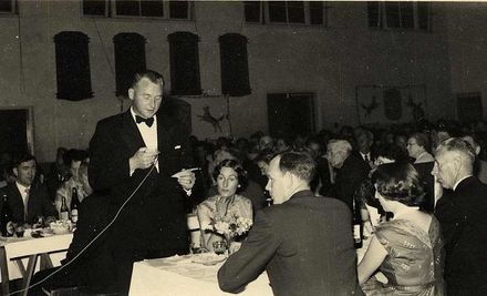 Unidentified Man Speaking at Dinner