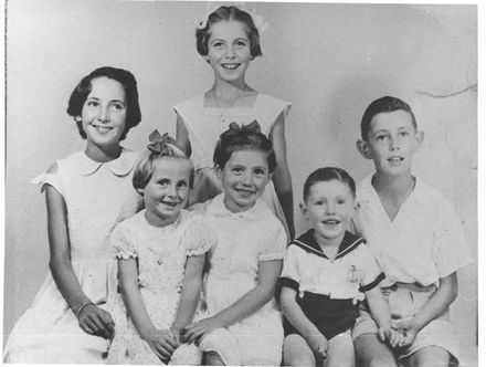 Family portrait of 6 unidentified children (4 girls & 2 boys), 1950's - 60's