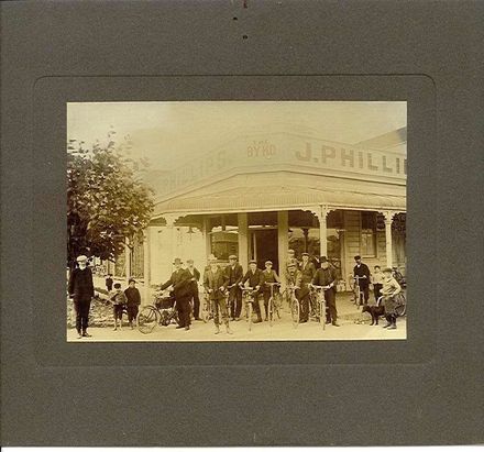Cyclists outside the "The Byko" shop.