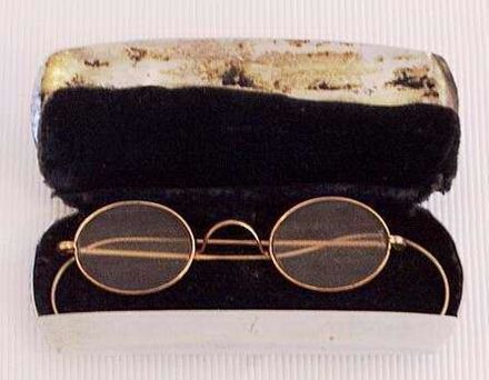 Eyeglasses in stainless steel case