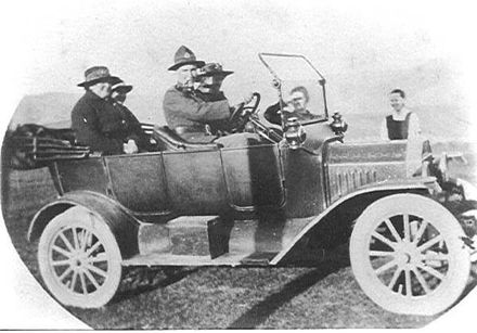 Ken Mitchell and others in car, c.1920's