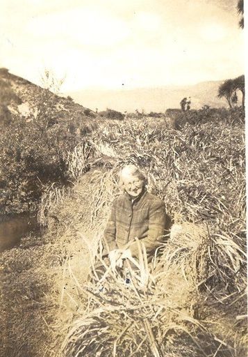 Dawn Clark (or Lett?) fishing at Manakau Beach 1946.