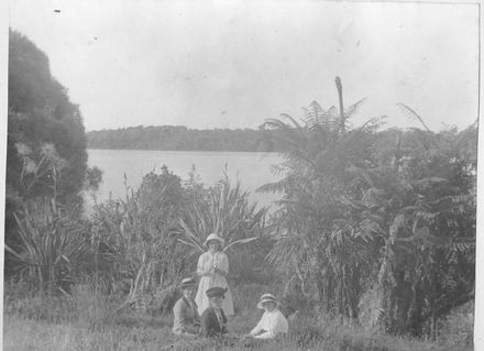 Four women at lake