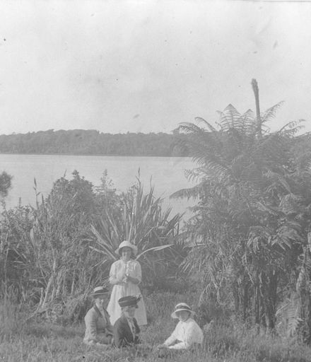 Four women at lake