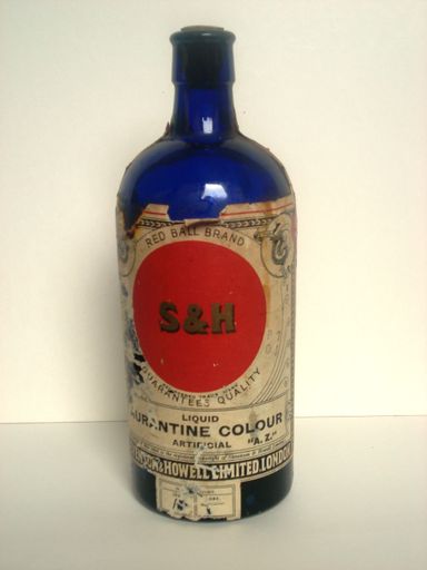 Bottle of food colouring (liquid Aurantine Colour) 1/2 full