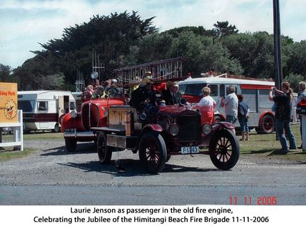 Laurie Jenson in the old fire engine at Himitangi beach.
