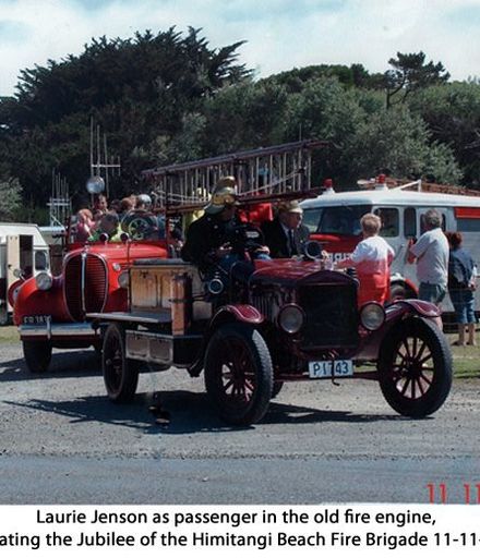 Laurie Jenson in the old fire engine at Himitangi beach.