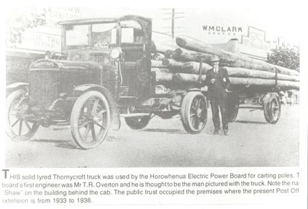H.E.P.B. Thornycroft truck with load of wooden power poles, c.1923
