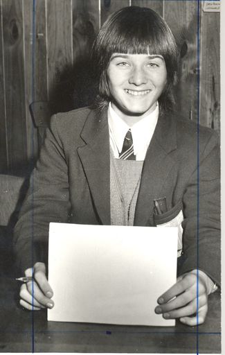 Otaki College girl (unnamed) holding pen & paper
