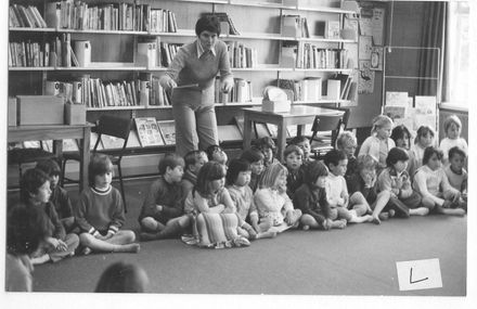 Children in library facing the children playing music - Resource cover image