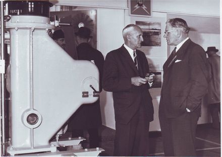 2 men outside Consumers Supply, Electricity Exhibition 1972