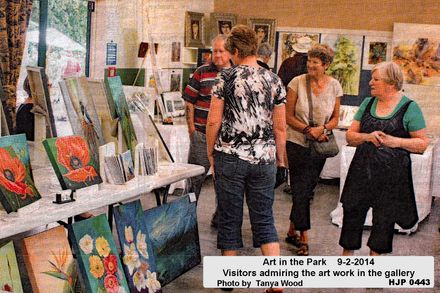 Art in the park 9-2-2014Visitors admiring the art work in the gallery