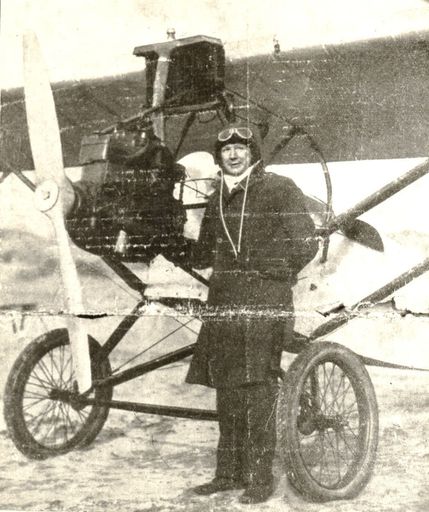 Jack Butler standing in front of his plane
