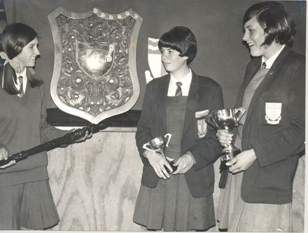 Otaki College girls (Heather Tews with tokotoko, ?, Jocelyn Black with cup) debate/speech winners