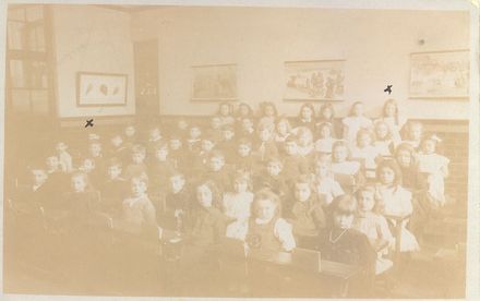 Interior photograph of a school room with primary aged students. - Resource cover image