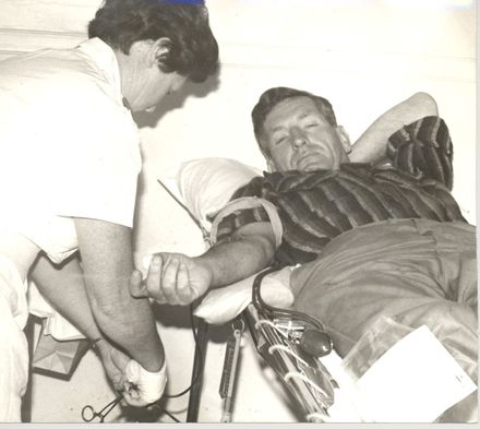 Man (unidentified) donating blood