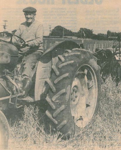 Mr Butt on old tractor with 75 year old reaper binder he helped rebuild - Resource cover image