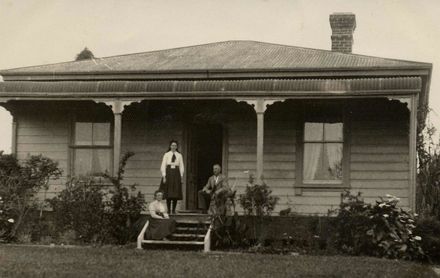 Three People on Verandah of Robinson Home, December 1910