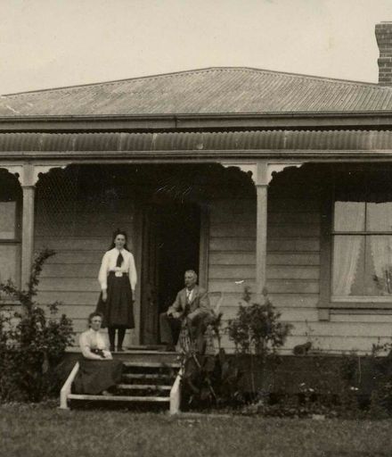 Three People on Verandah of Robinson Home, December 1910