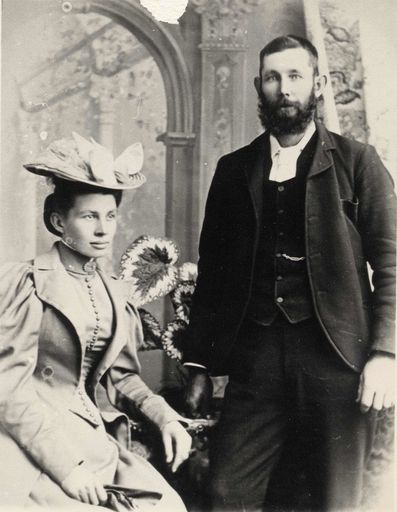 Man & woman (unidentified) in studio