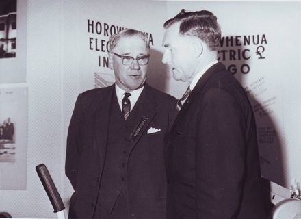 2 men in Consumers Supply display, Electricity Exhibition 1972