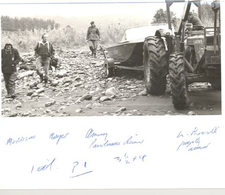 Men with tractor & boat on trailer at river bank ? - Resource cover image