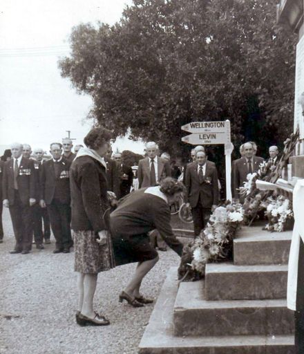 Vera Claridge and Margaret Donnelly laying Red Cross wreath, Anzac Day mid 1970's