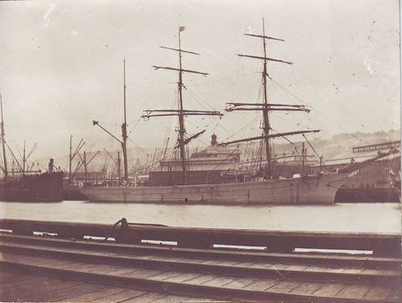 Unidentified 3-masted sailing ship at wharf