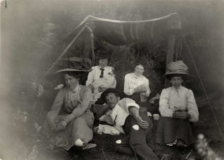 Group (unidentified) 4 women, baby & man on picnic