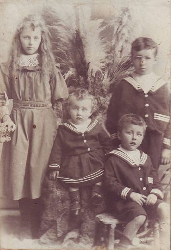 Four unidentified children (2 girls & 2 boys)