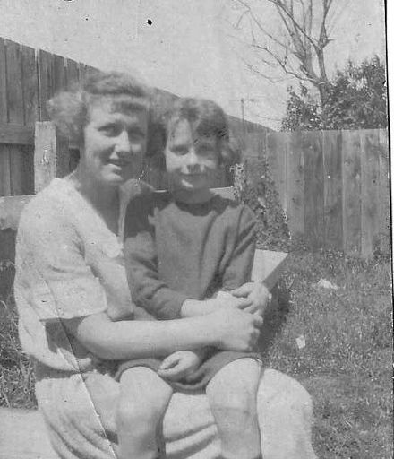 Miss Katie McKegg with Billie Brown sitting on her knees, early 1920's