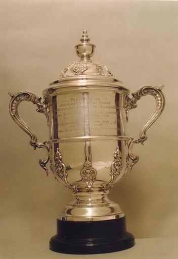 Trophy - Silver Cup (with handles and top) mounted on black base and inscribed