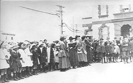 Crowd listening to News of Peace