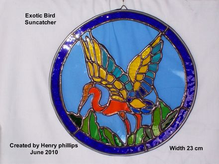 Exotic bird on round base - Resource cover image