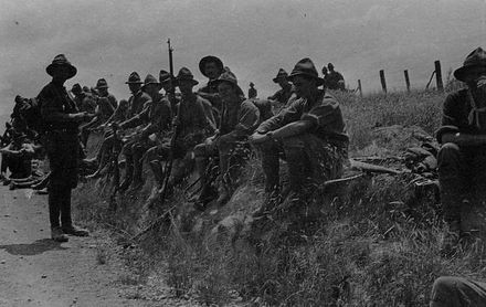 Soldiers Resting on Roadside