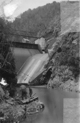 Two workmen downstream of No.2 Dam, Mangahao, 1936