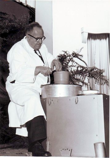 Man using potters wheel on stage, Electricity Exhibition 1972 - Resource cover image