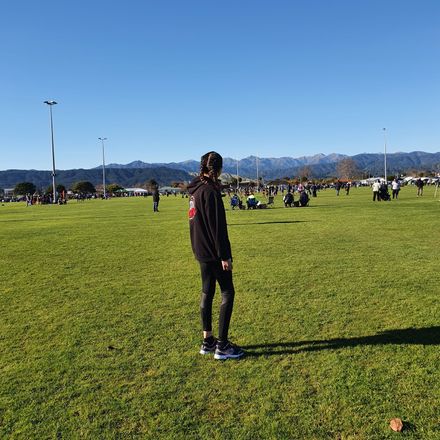 Moko watching winter rugby at Playford Park with view of Tararua Te Maunga - #CaptureYourHorowhenua - Resource cover image