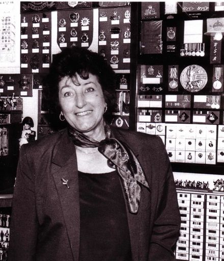 Betty Rosanoski Beside Military Medal Display, 1980's-90's