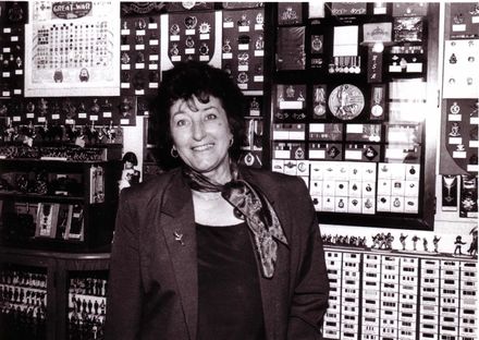 Betty Rosanoski Beside Military Medal Display, 1980's-90's