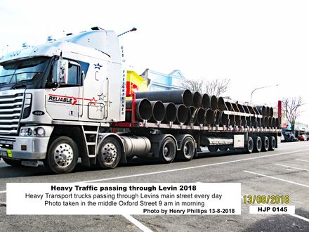 Heavy laden trucks passing through Levin 13-8-2018