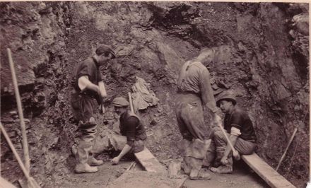 Four unidentified men 'hand drilling' entrance for by-pass tunnel, 27 October 1926