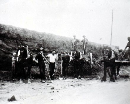 Workmen excavating soil from a cutting, c.1884